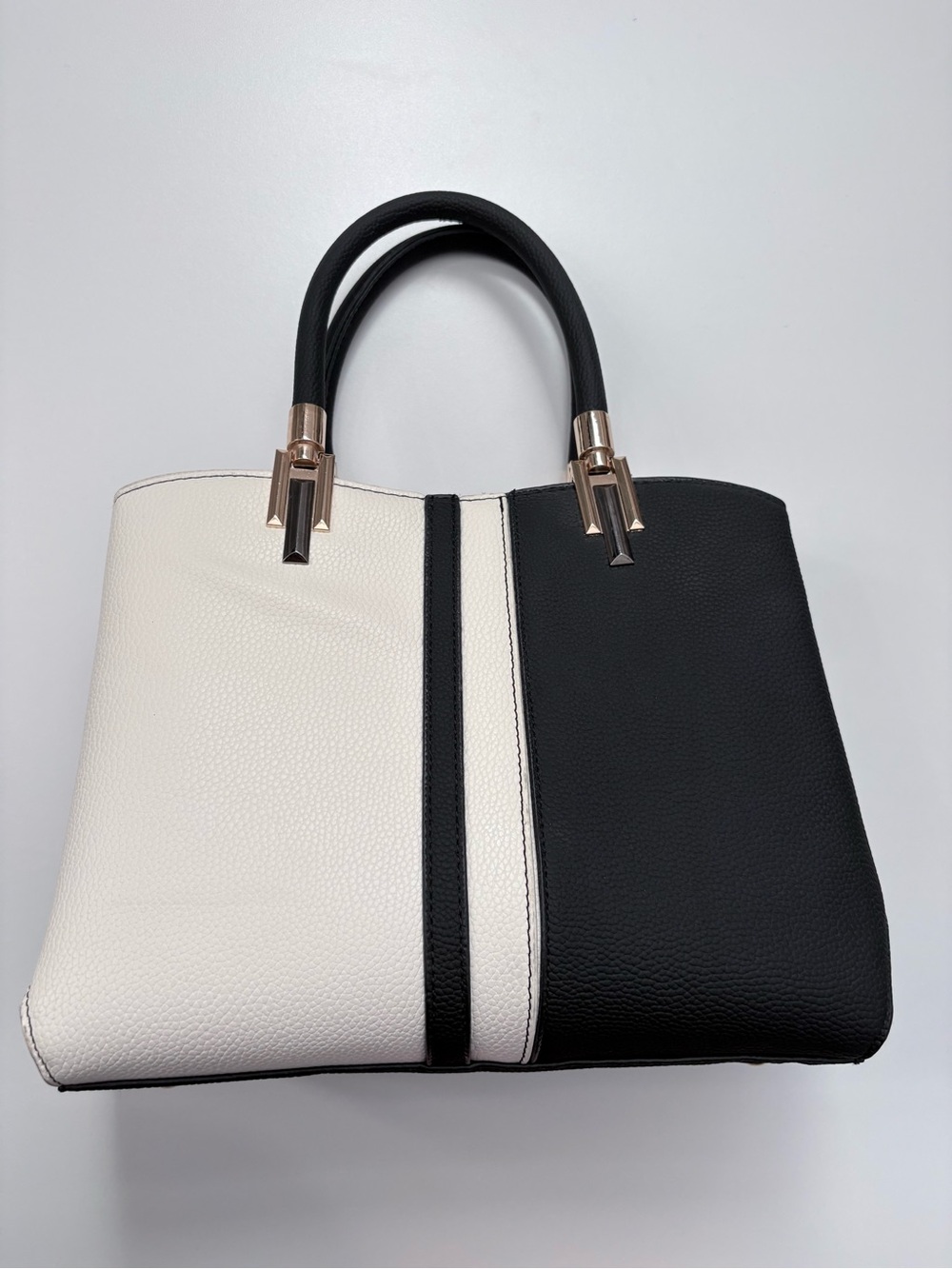 Chic Two-Tone Black & White Satchel / Top-Handle Handbag with Gold Accents